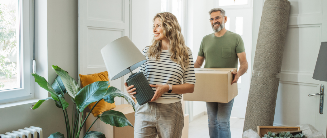 middle aged couple moving into a new home